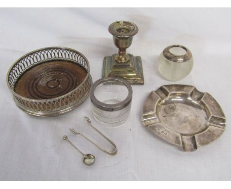 Selection of silver items to include a silver ashtray (1.86 ozt), match striker, wine holder, candlestick etc