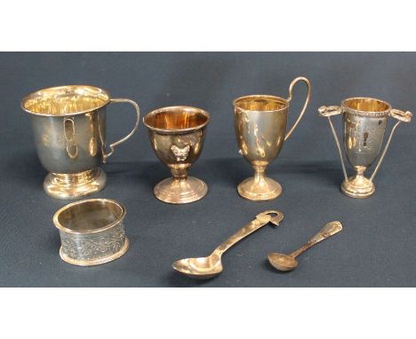 Silver christening cup, egg cup, 2 small trophies &amp; napkin ring and christening spoon marked Nepal, 7.23ozt