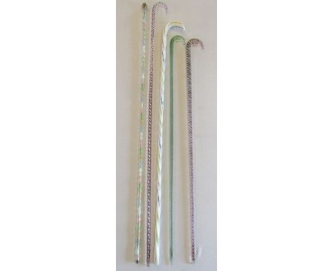 5 glass walking canes - pale green glass spirally moulded walking stick containing red and white spiralling - clear glass pla