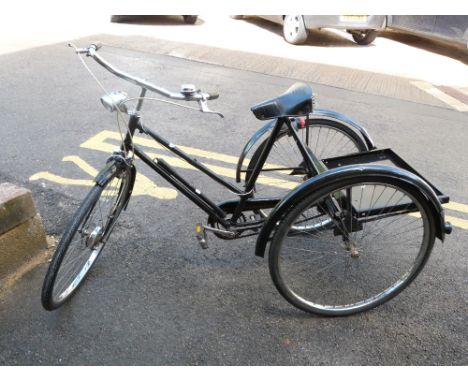 A vintage George Fitt tricycle 