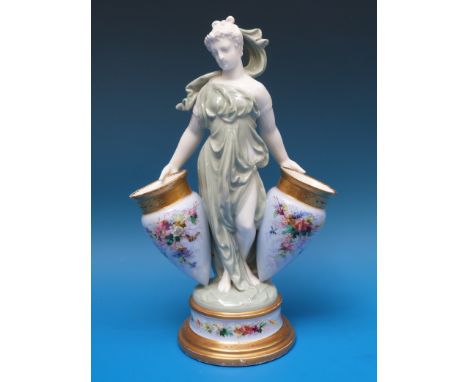 A rare Royal Worcester figurine, with hand-decorated bud vases either side as amphora (height 27cm)