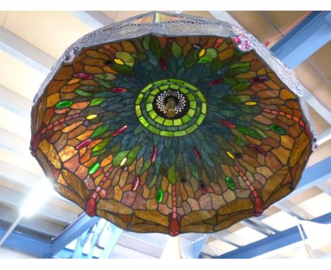 A contemporary large Tiffany style lamp shade, featuring dragonflies