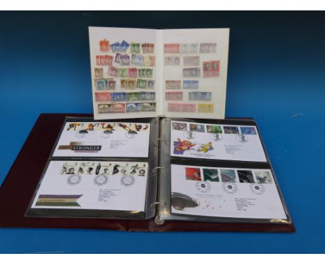 A stockbook of British and Colonial stamps and a GB first day cover album