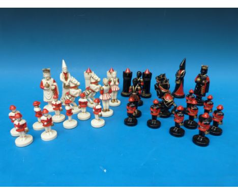 A bakelite / early plastic hand-decorated medieval "knights" chess set in box