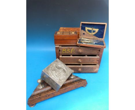 A collection of treen to include a small tool box, cribbage box, walnut box, pewter box, drawing set and ink stand etc