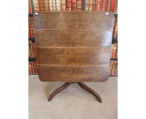 A Georgian mahogany tilt top table raised on tripod base (77 X 72cm)