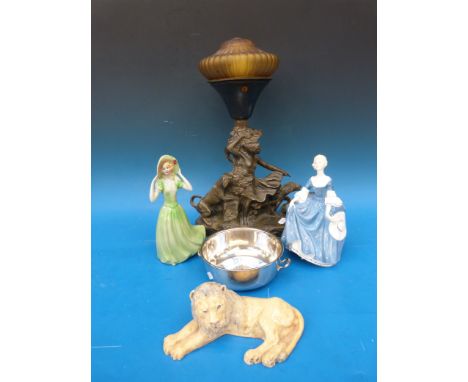 An Art Nouveau style lamp, a Royal Doulton figure Hilary (HN 2335), another figure of a lady, a model of a lion with F Walker