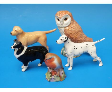 Three small Beswick dogs, a Dalmatian, a collie and a golden retriever together with a Beswick owl and a Royal Worcester robi