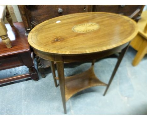 An Edwardian inlaid table with under-shelf (max diameter 61cm, H71cm)