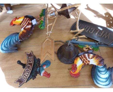 Two cast cockerel welcome signs and similar style weather vane 