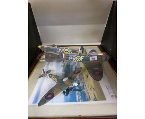 Three Corgi WWII diecast model aeroplane together with a print of Spitfires. 