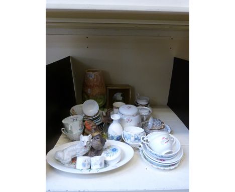 A quantity of teaware trios etc including an Art Deco (possibly Sylvac) vase, a Radford oval tray, Coalport, and a Poole thru