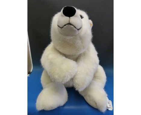 A very large Steiff polar bear with button to ear and original label to body (height 117cm)