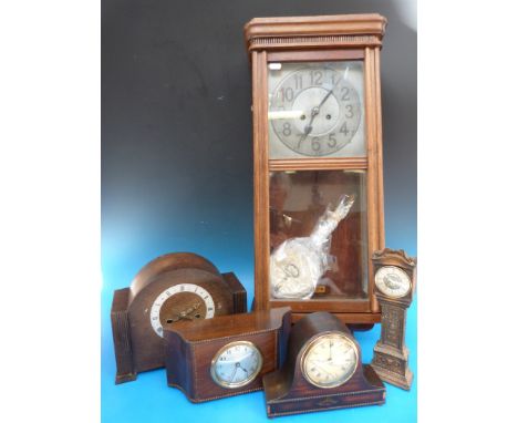A collection of mantel clocks to include a miniature grandfather clock and an Art Deco example