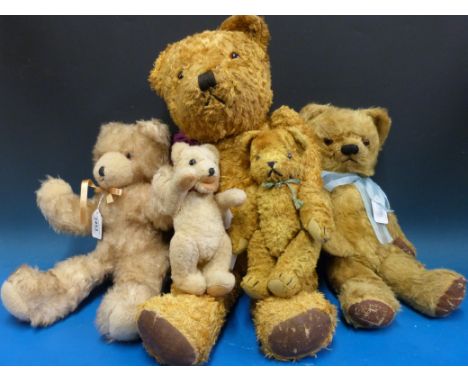 Five vintage bears, one mohair and one straw filled , the largest 60cm tall. 