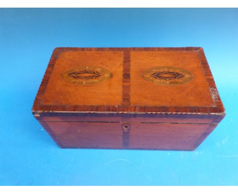 A Georgian mahogany inlaid and cross banded two dominion tea caddy 