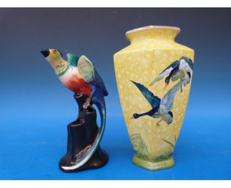 A Wilkinson pottery flower frog, with bird finial, and a Burleigh ware Art Deco vase decorated with ducks in flight