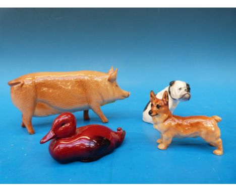 A Royal Doulton Tamworth sow together with a small flambe duck, a bulldog and a corgi