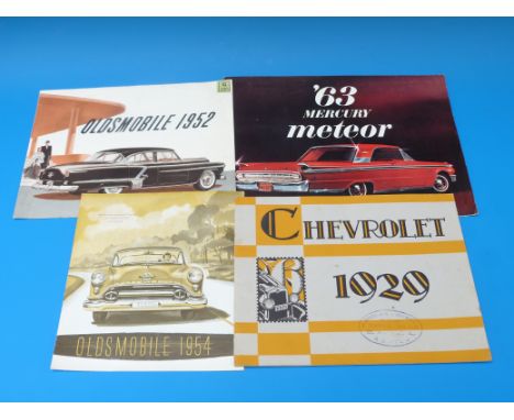 A 1929 Chevrolet leaflet, Oldsmobile 1954 and 1952 leaflets and a 63 Mercury Meteor booklet 