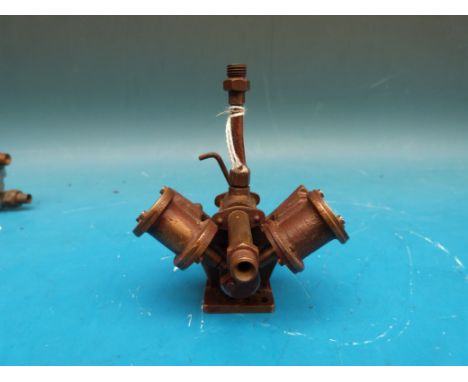 A Stuart Turner V twin cylinder marine engine with oscillating cylinders and regulator 