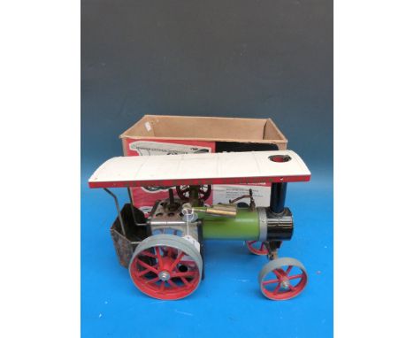 A Mamod T.E.1 traction engine with steam regulator, lever type whistle and pop rivet construction complete with steering exte