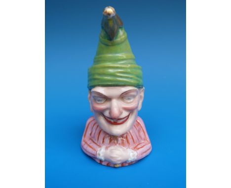 A late 19th/20thC Royal Worcester candle snuffer of Punch