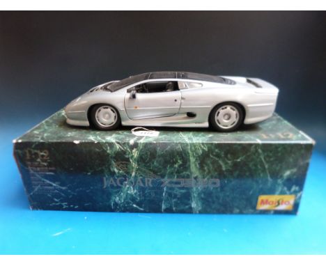 A Maisto 1:12 scale diecast model Jaguar XC220, in original box