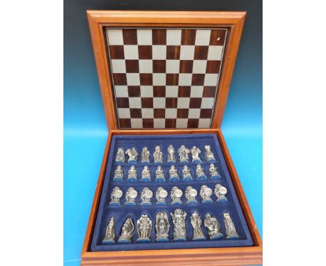 A Tudor Mint cased Lord of the Rings chess set
