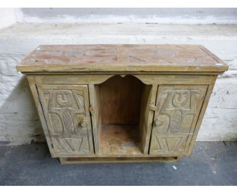 A carved wall mounted shelf unit, magazine rack and a footstool