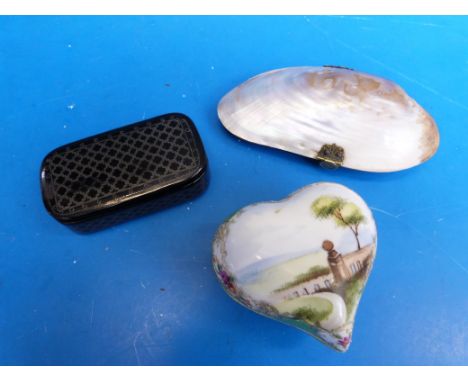 A lacquer snuff box with pewter geometric inlay, a purse formed from a shell with label for Lunt & Griffiths of Rhyl and a No