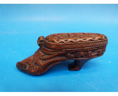 A 19thC carved mahogany snuff box in the form of a ladies shoe