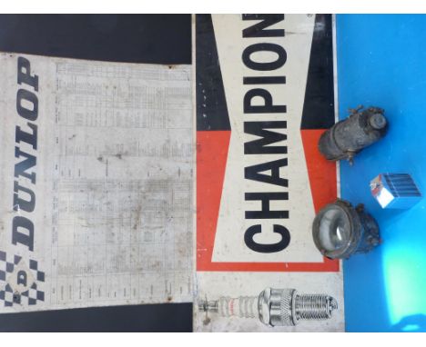 A metal Dunlop garage sign together with a Champion example, an acetylene lamp set and a small Rolls Royce radiator 