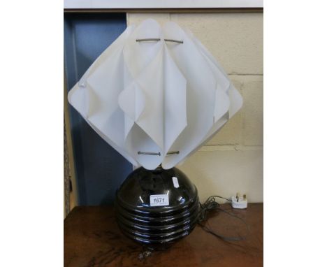A 1920s Art Deco table lamp with ribbed globe shaped base