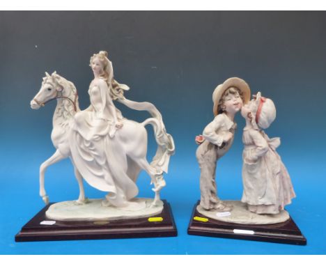 Three Georgio Armani Florence figurines, one in the form of a lamp. 