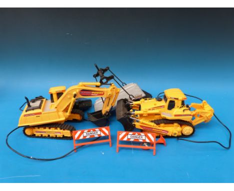 A collection of large scale model vehicles to include a remote control crane 