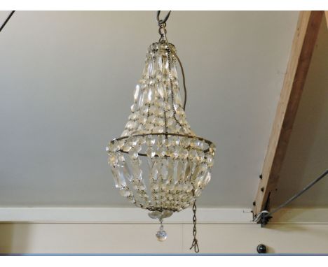 A gilt brass and glass lustre electrolier, and a painted two branch wall light