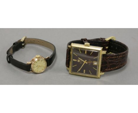 A ladies 9ct gold Tudor mechanical strap watch, and a gentleman's gold plated Tissot automatic strap watch, with square mahog
