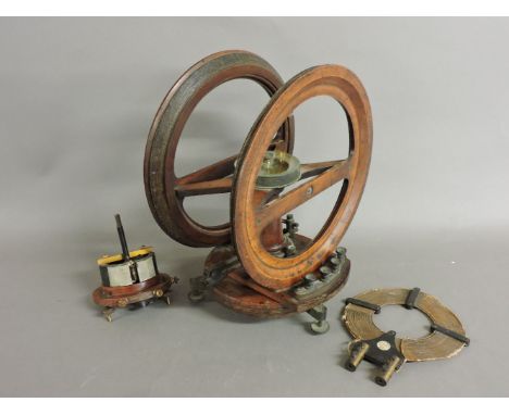 A Victorian Helmholtz type tangent galvanometer, inscribed MP.004, 42cm high, a part Gambrell Bros galvanometer, and a coil f