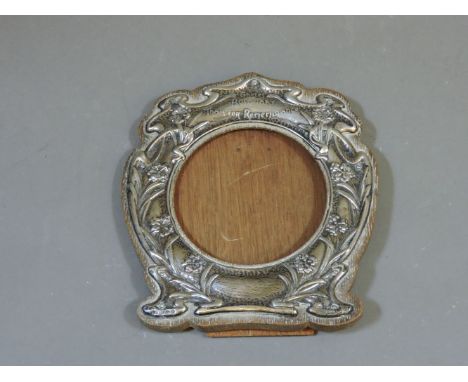 An Edwardian silver mounted wooden photograph frame, by J Aitkin & Son, Birmingham 1904, registration number Rd No 416318, of