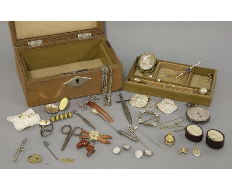 A jewellery box, containing a collection of costume jewellery to include a Georgian enamel and gold stick pin, a shell cameo 