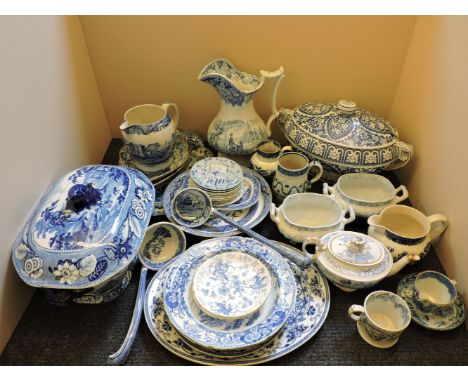 A large quantity of blue and white ceramics, to include two Spode dishes, a large Victorian Iznik style design tureen, a blue