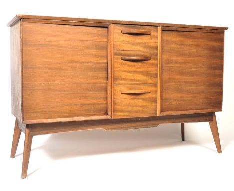 Alfred Cox - A 1970's retro vintage 20th century teak wood sideboard credenza having a central bank of 3 drawers with pull ha