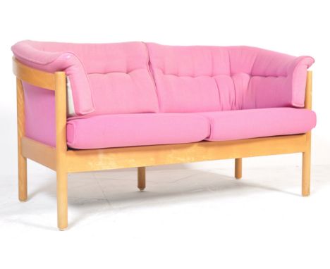 Niels &amp; Lause - Nielaus - N100 - A Danish contemporary two person love seat sofa settee having beech wood frame and pink 