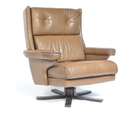 Madsen Og Schubel - A 1970's Danish buffalo hide large leather swivel desk / lounge chair / armchair. The chair upholstered i