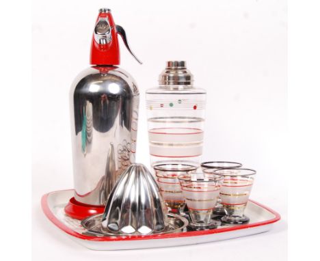 A collection of 20th century retro vintage cocktail drink wares to include; 1950's glass polka-dot cocktail shaker with four 