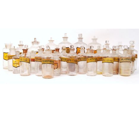 A LARGE collection of 37 x early 20th century antique vintage apothecary chemist medicine glass jars each having the original