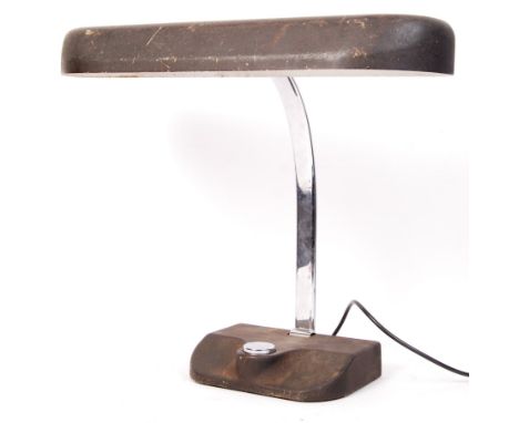 An Art Deco 1930's vintage industrial cast metal and chrome bankers lamp . The lamp having a large shaped cast metal weighted