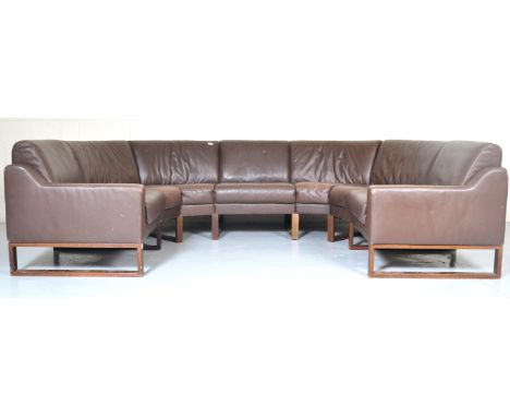 A 20th century Scandinavian retro vintage seven piece modular ' U ' shaped chocolate brown aniline leather sofa couch settee 