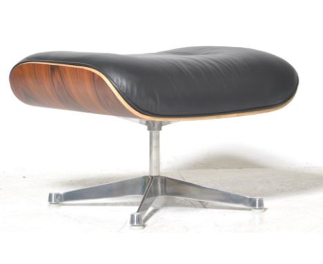 After Charles &amp; Ray Eames - Plycraft - A contemporary lounge chair ottoman comprising of Palisander plywood shell with bl