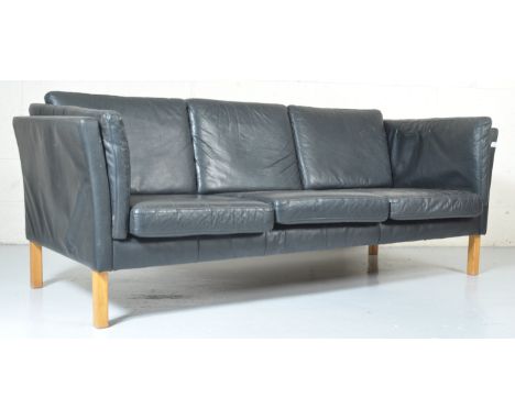 Believed Stouby - A 20th century Danish retro vintage black leather high sided London type three seat sofa settee with leathe